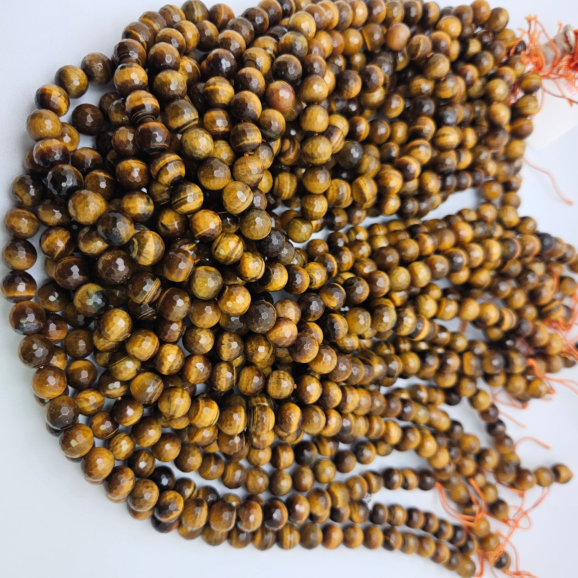 8mm Tiger's Eye Faceted Round