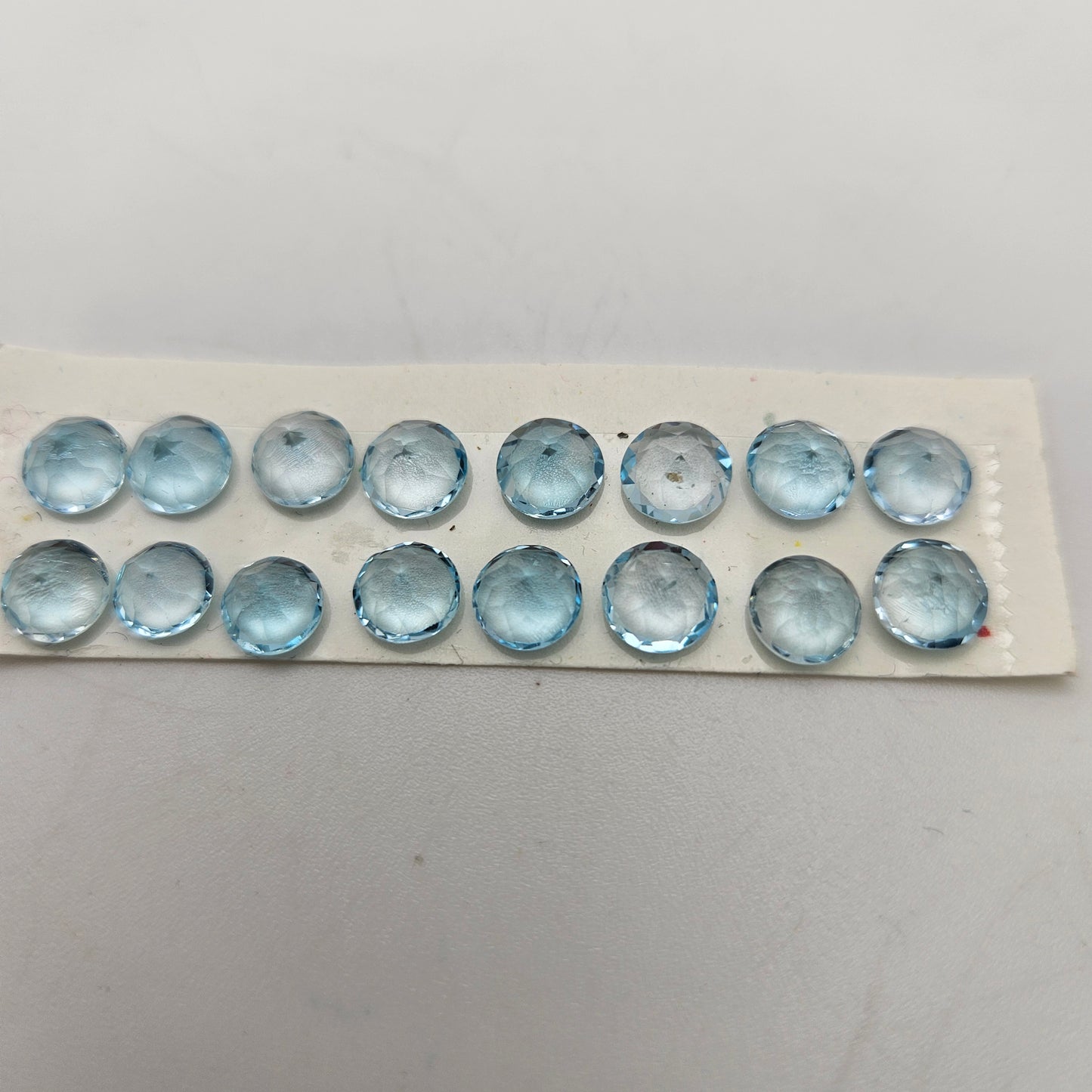 6mm Blue Topaz Round Cabochon Faceted