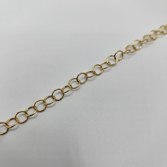 A gold-plated chain necklace with medium-sized circle links