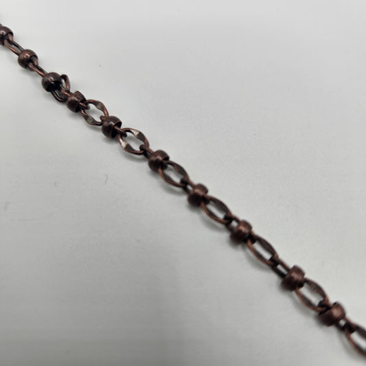 A foot-long copper chain, likely used for jewelry making or craft purposes.