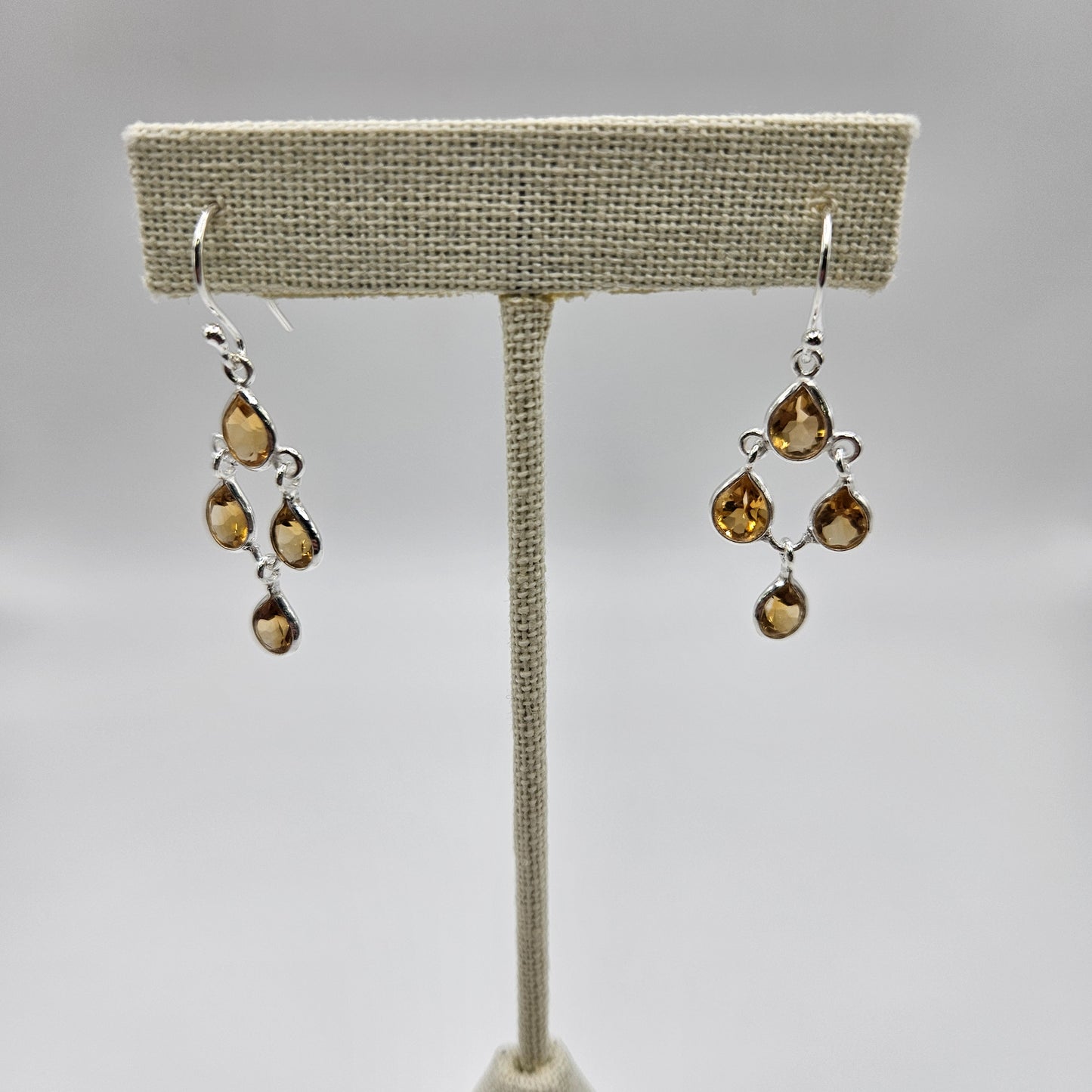 citrine teardrop faceted earrings on a sterling silver hooks