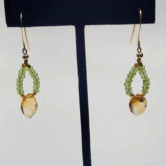 Pair of earrings with green beads