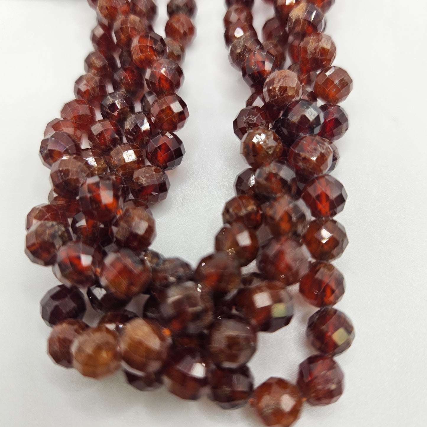 7mm Orange Garnet Faceted Round Bead Strand