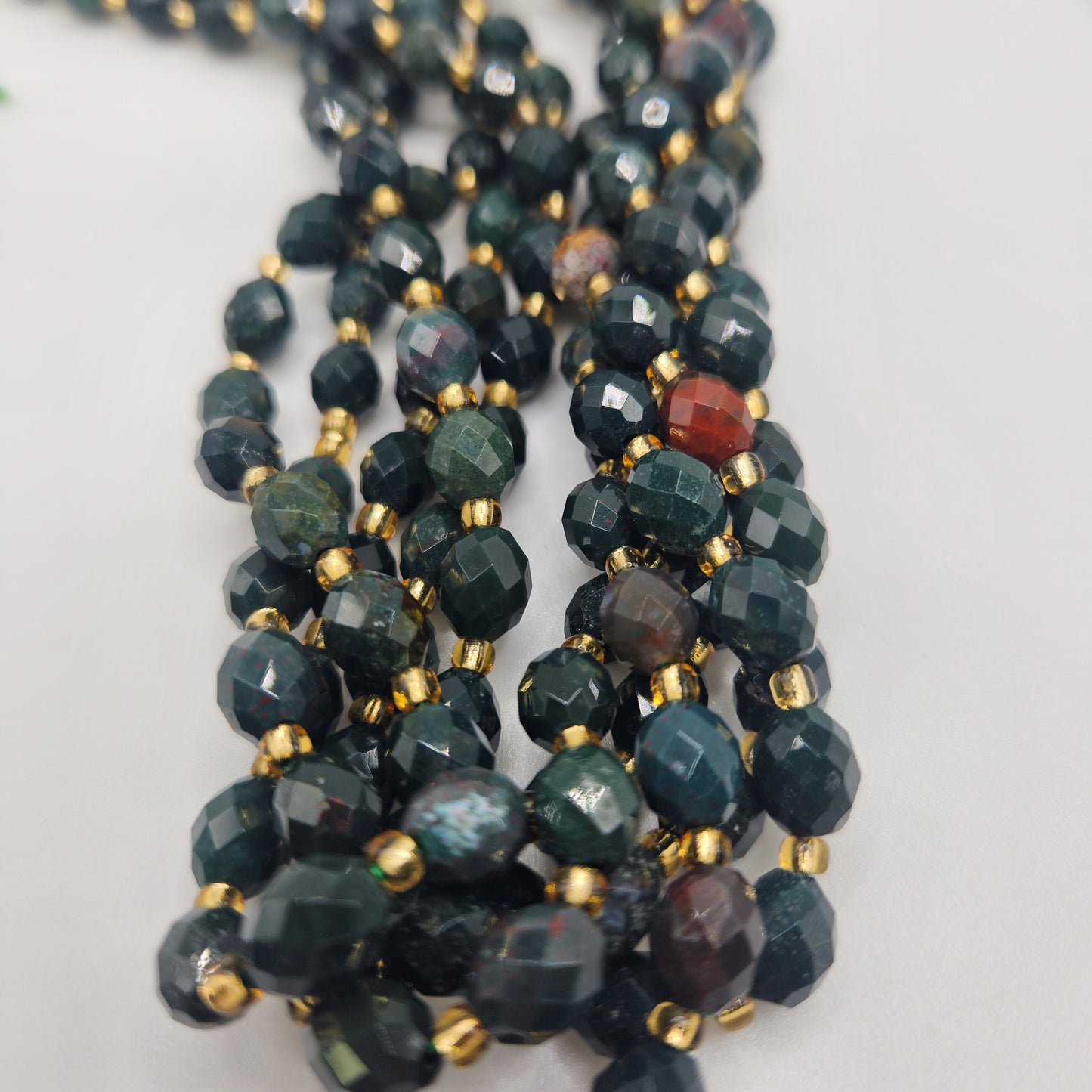 8mm Bloodstone Faceted Oval Bead Strand