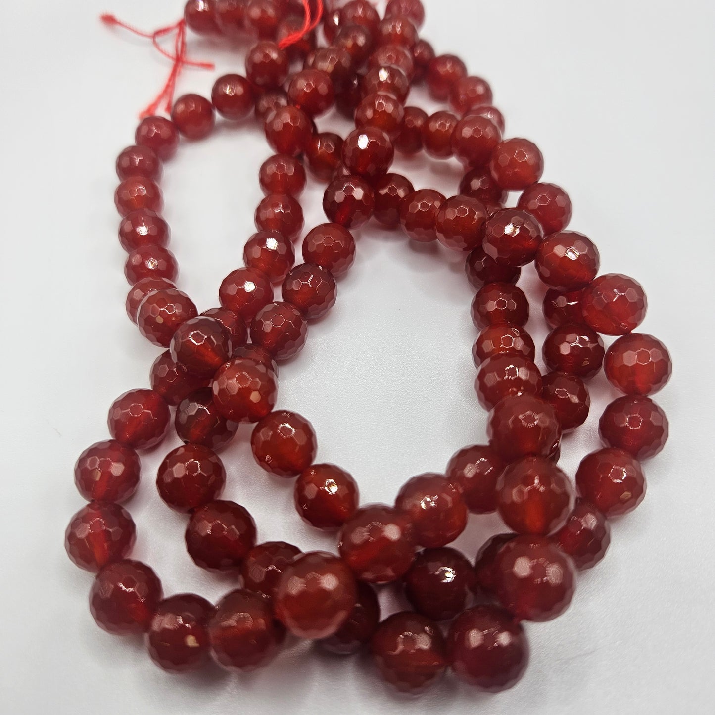 10mm Faceted Carnelian Round Bead Strand