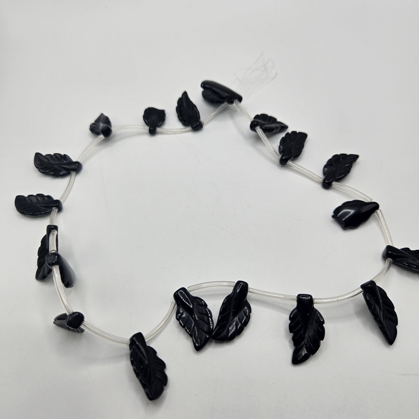 8x20mm Black Onyx Carved Leaf Bead Strand.