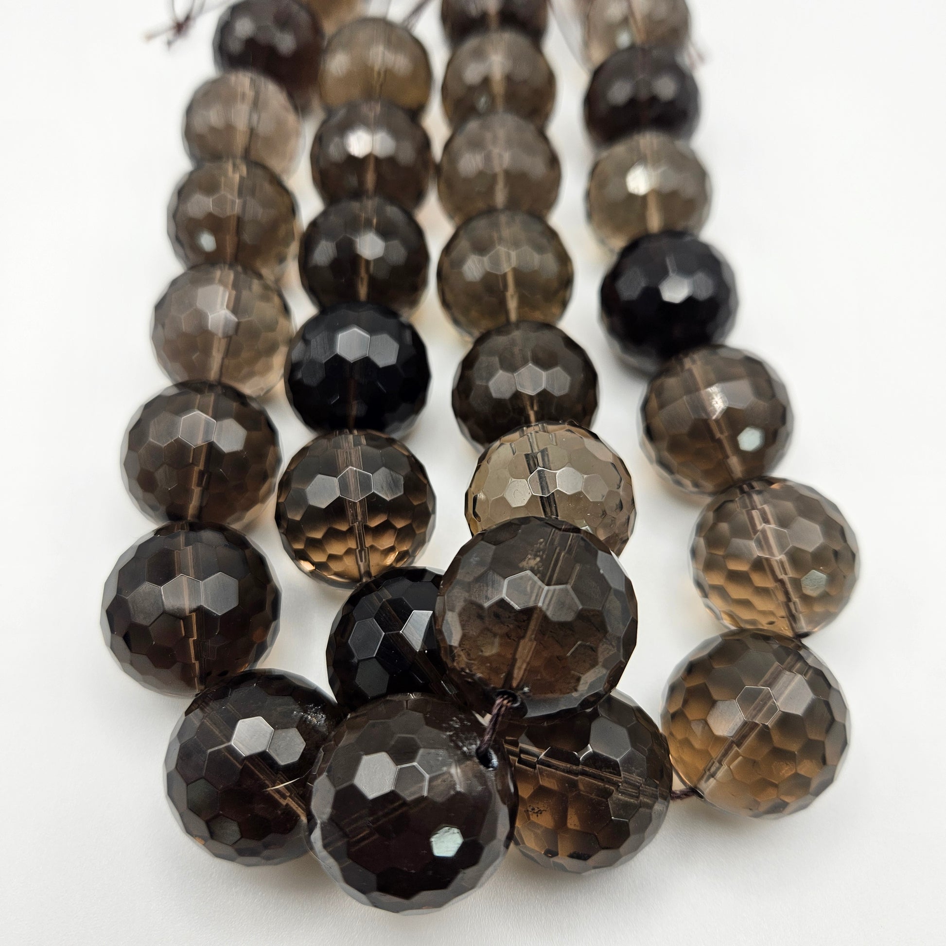 20mm Smoky Quartz Faceted Bead Strand.