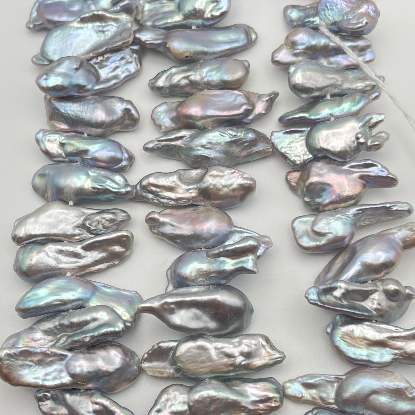 25mm Grey Pearl Biwa Stick Strand.