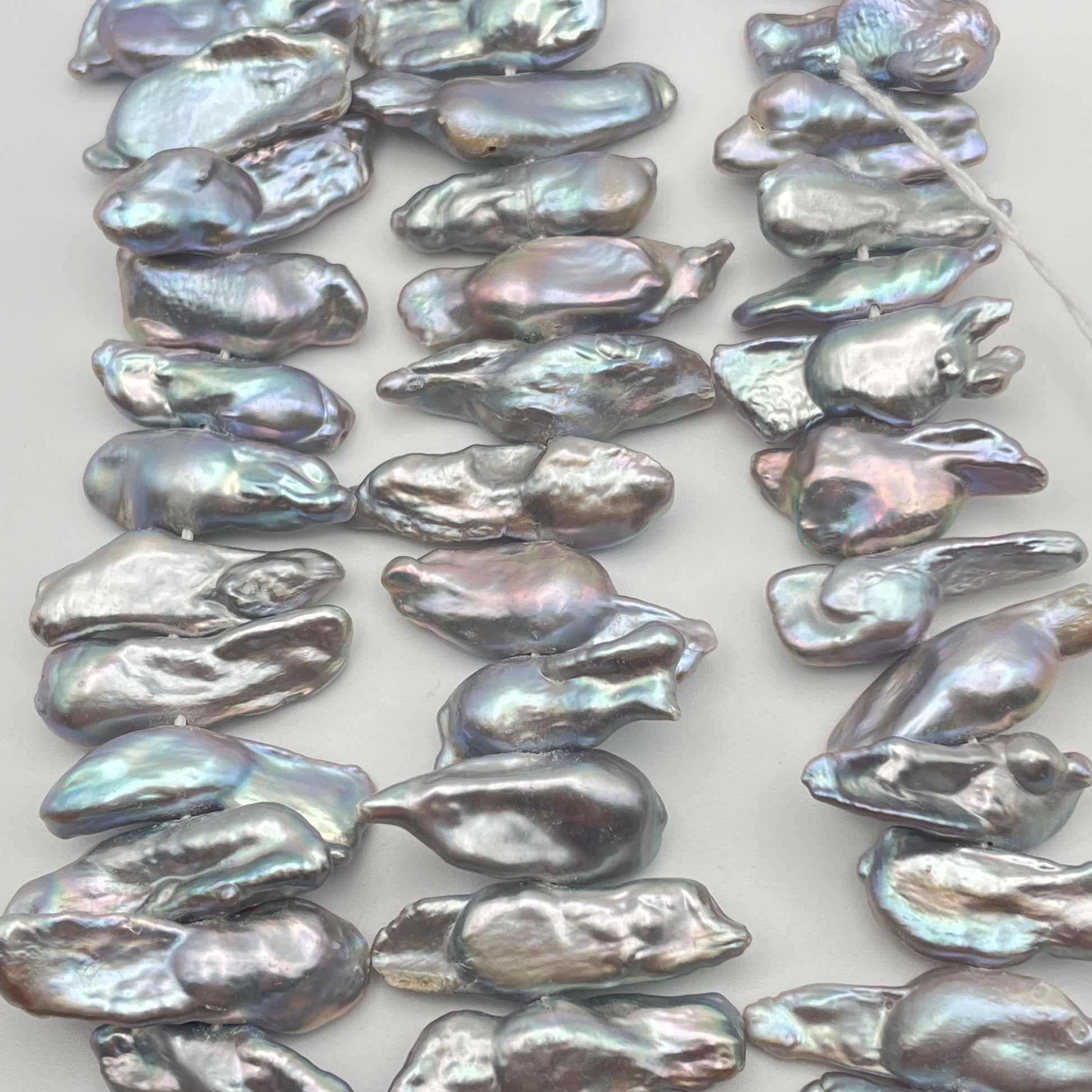 25mm Grey Pearl Biwa Stick Strand.