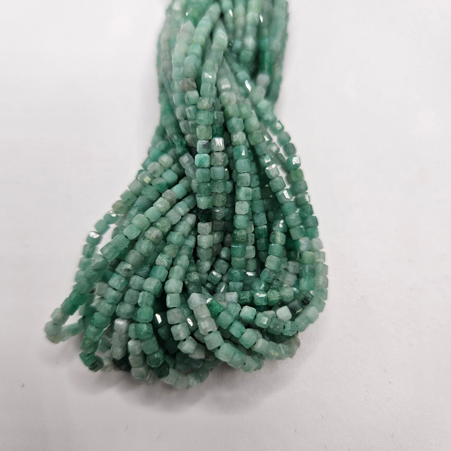 2mm Emerald Square Faceted Strand.