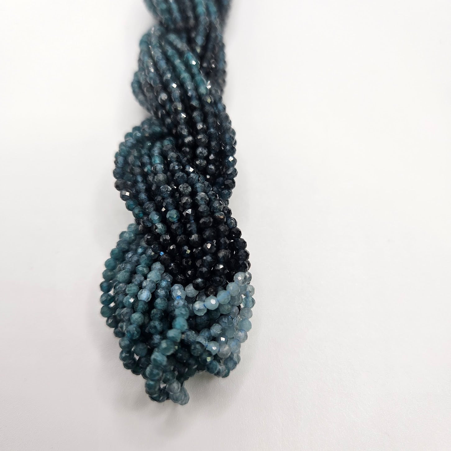 2mm Grandidierite Ombre Faceted Strand.