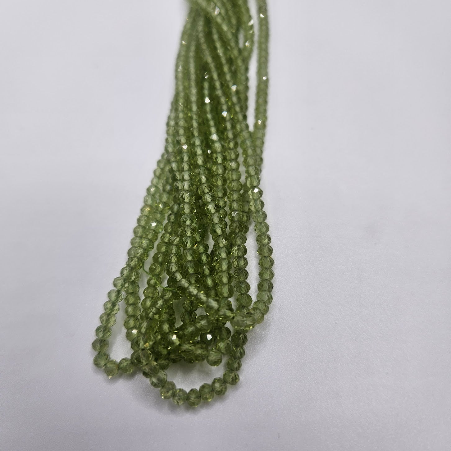 2mm Peridot Faceted Strand.