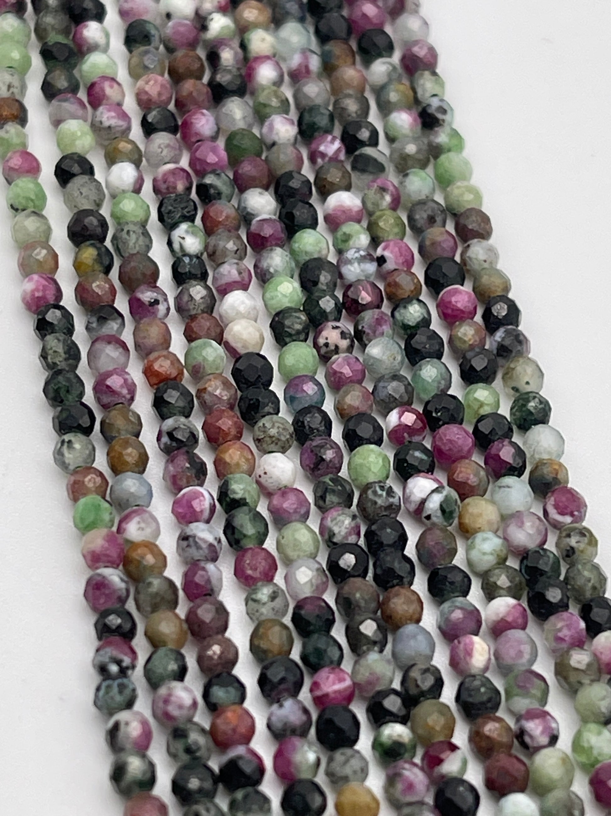 2mm Ruby Zoisite Faceted Round Bead Strand.