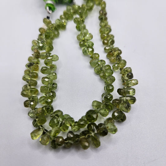 3 by 5mm faceted peridot briolette peridot bead strand.
