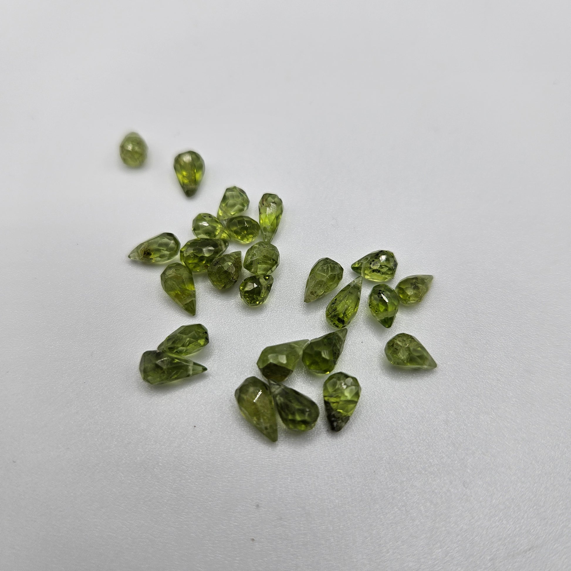3 by 5mm faceted peridot briolette peridot single bead.