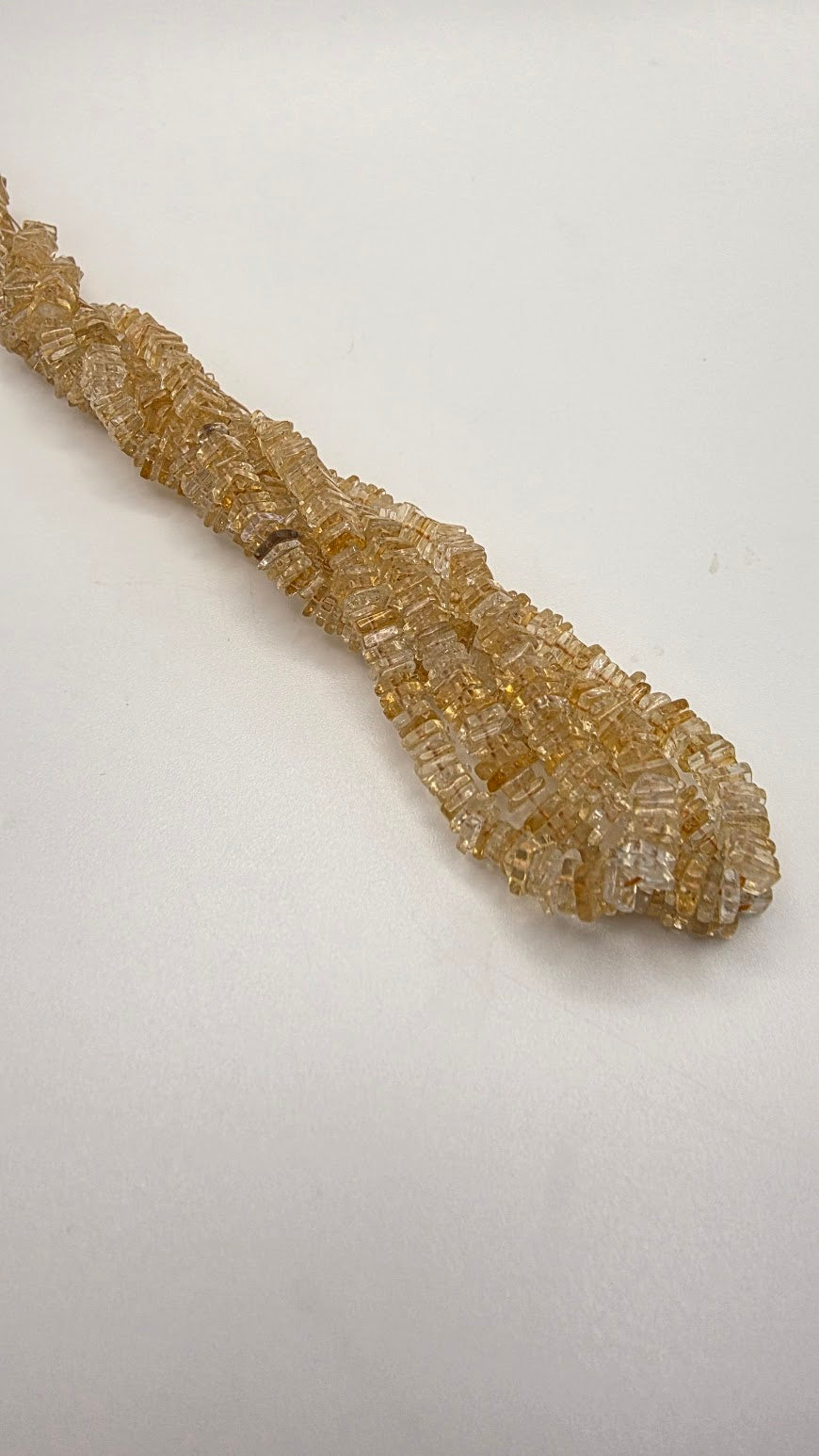 3mm citrine slice bead strand.