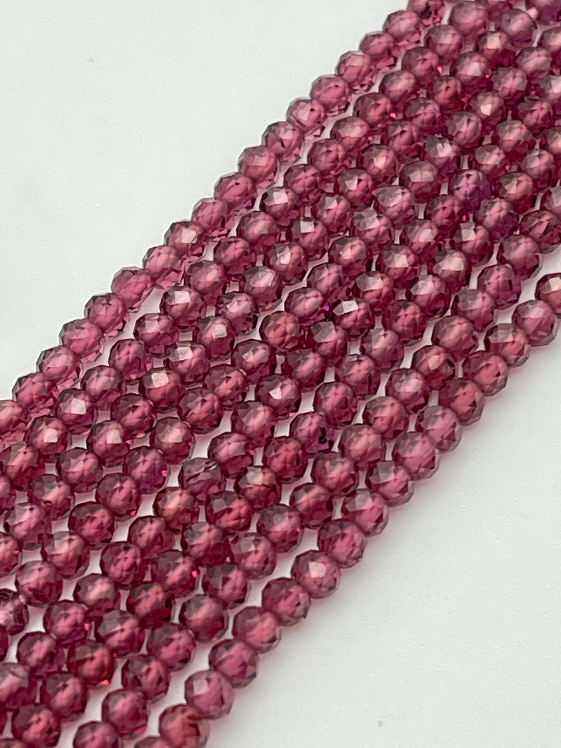 3mm Faceted Garnet Round.