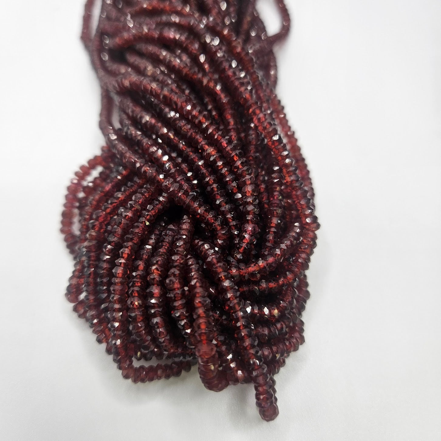 3mm Garnet Faceted Strand.