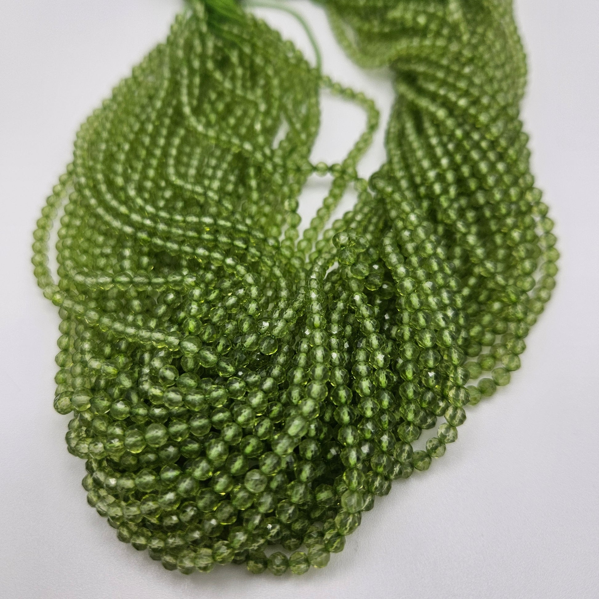 3mm Peridot Faceted Round Bead Strand.