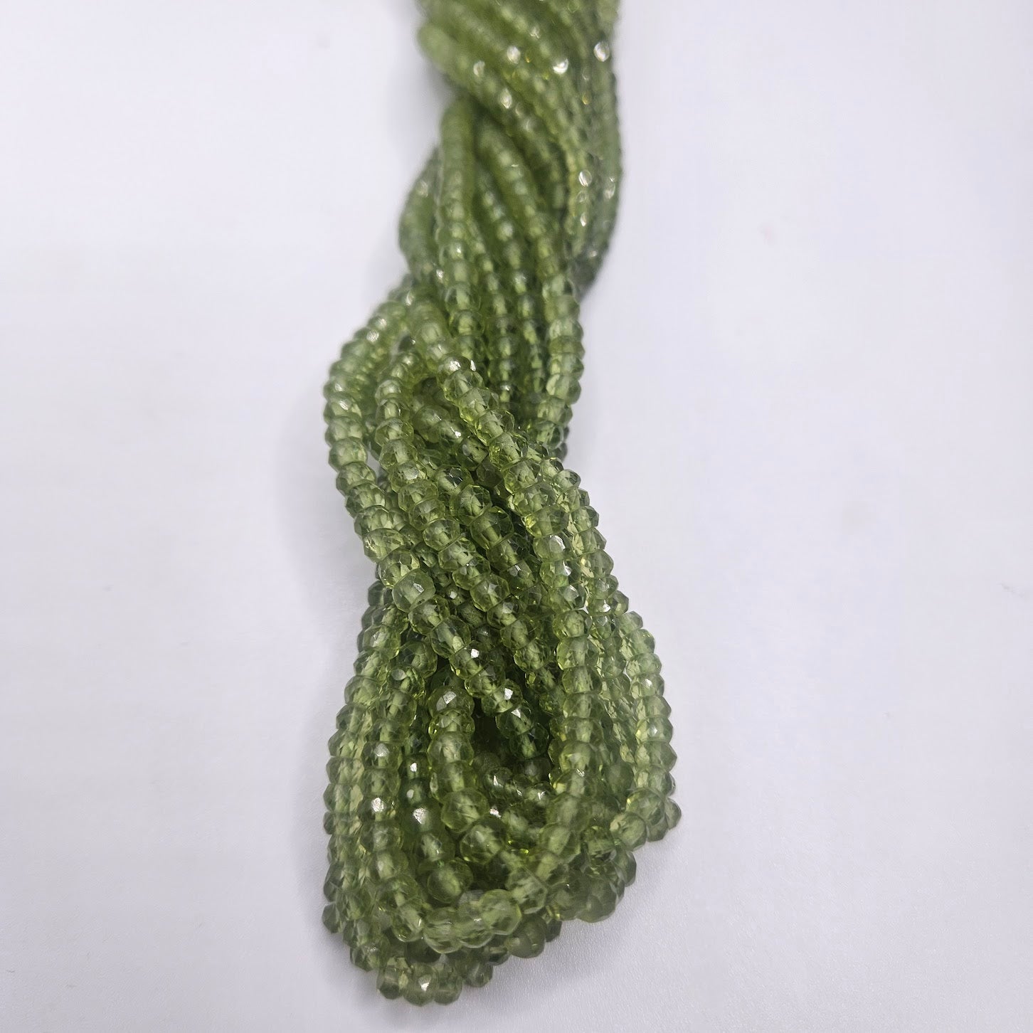 3mm Peridot Faceted Strand.