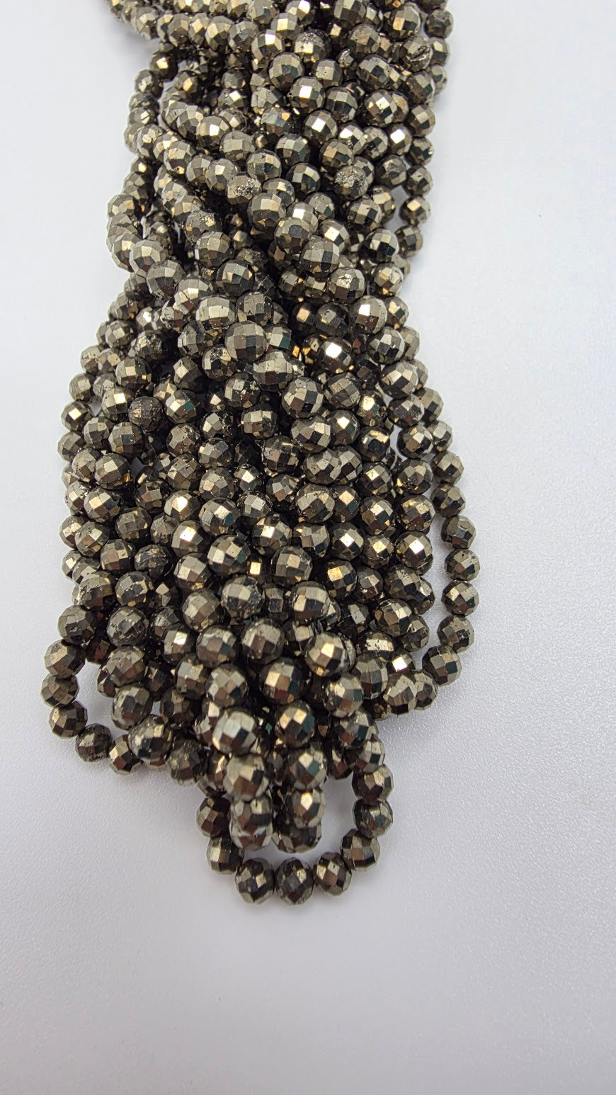 3mm pyrite faceted bead strand.