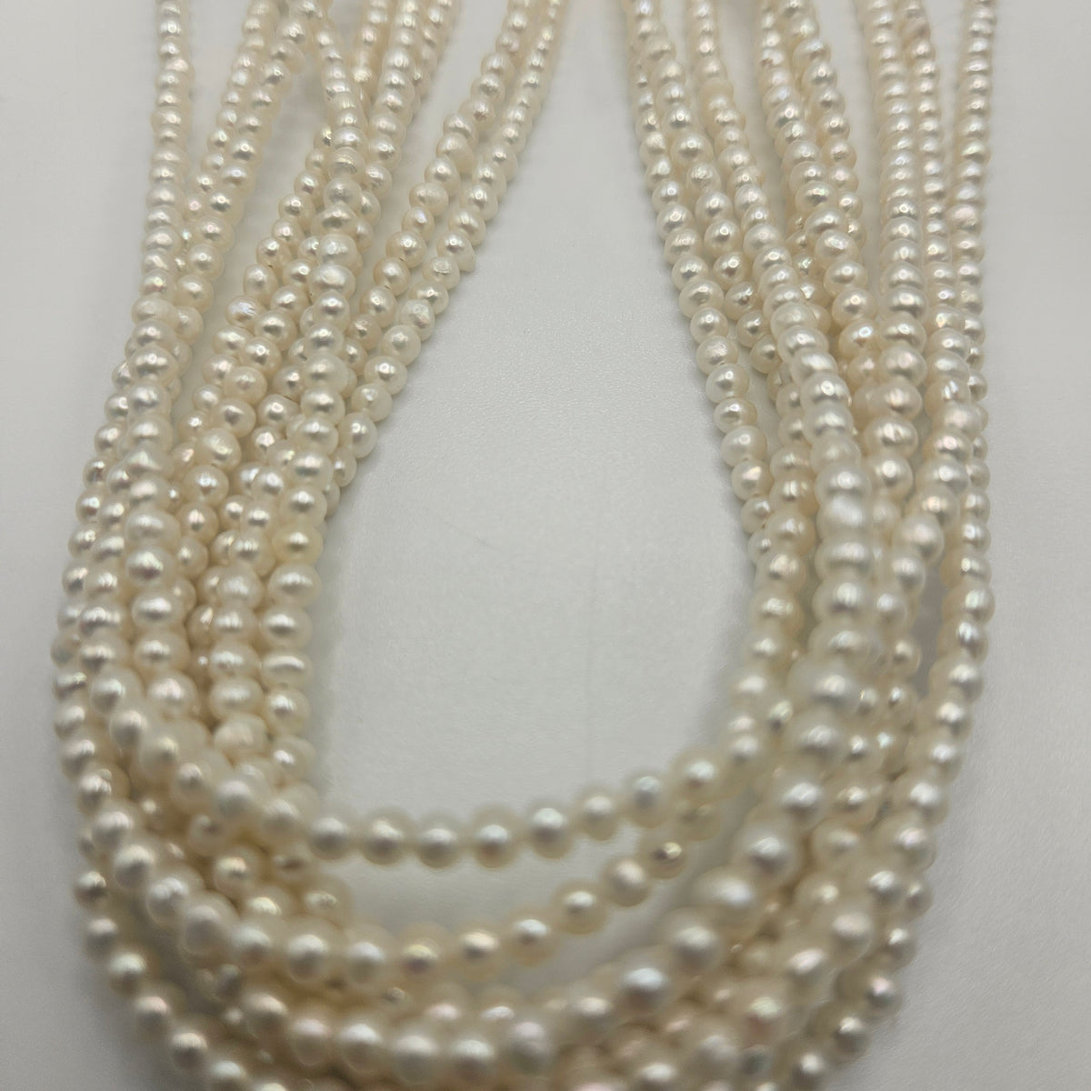 3mm Round Fresh Water Pearl Strand.