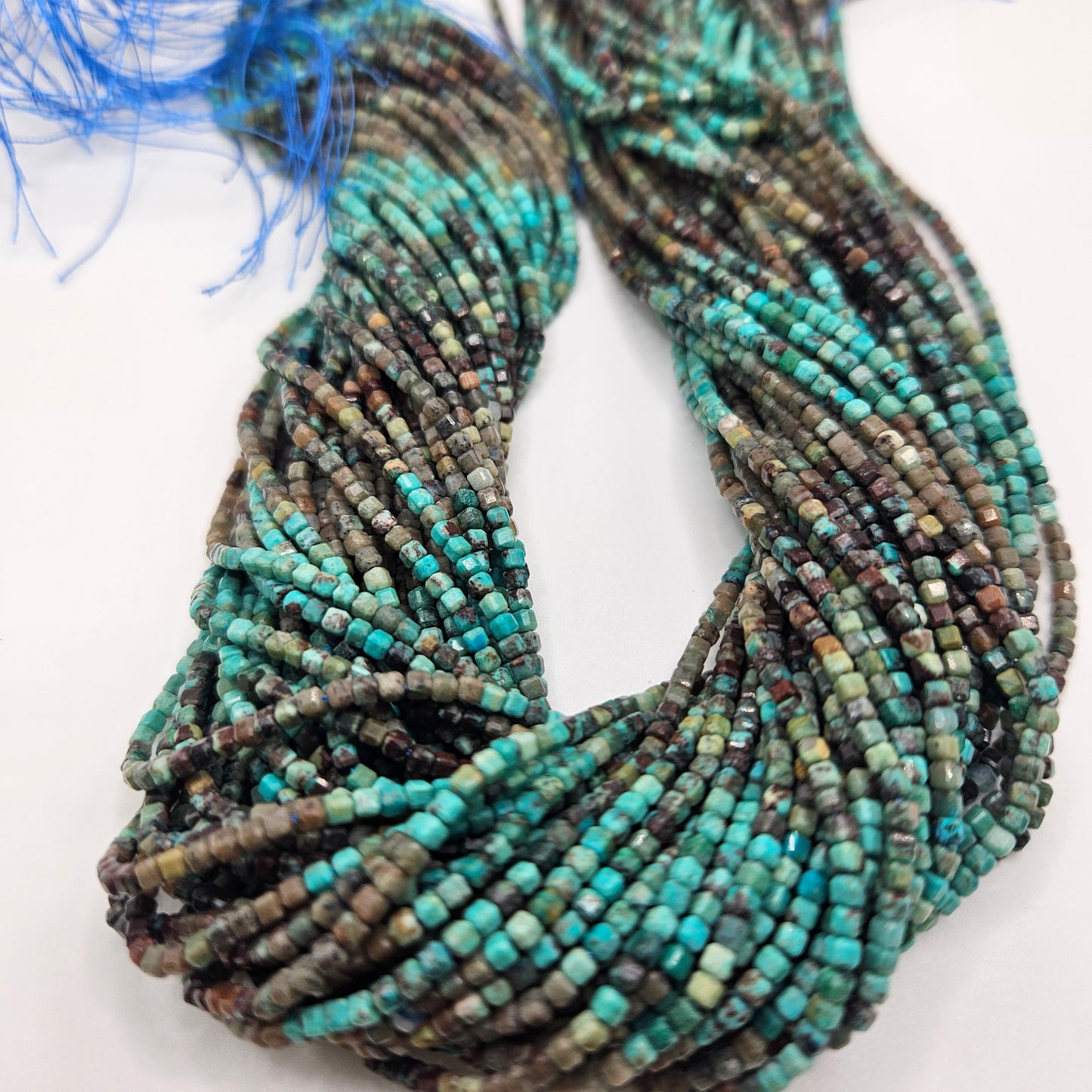 3mm Turquoise Cube Bead Strand.