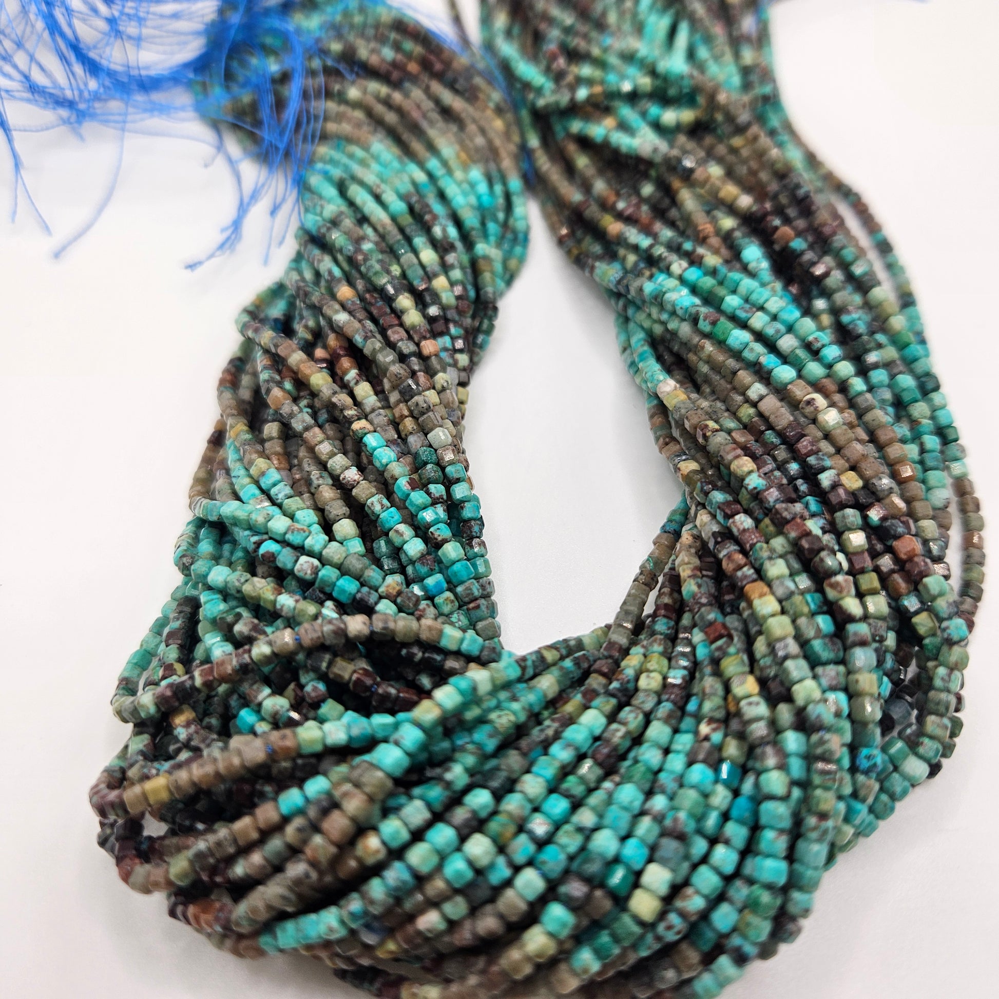3mm Turquoise Cube Bead Strand.