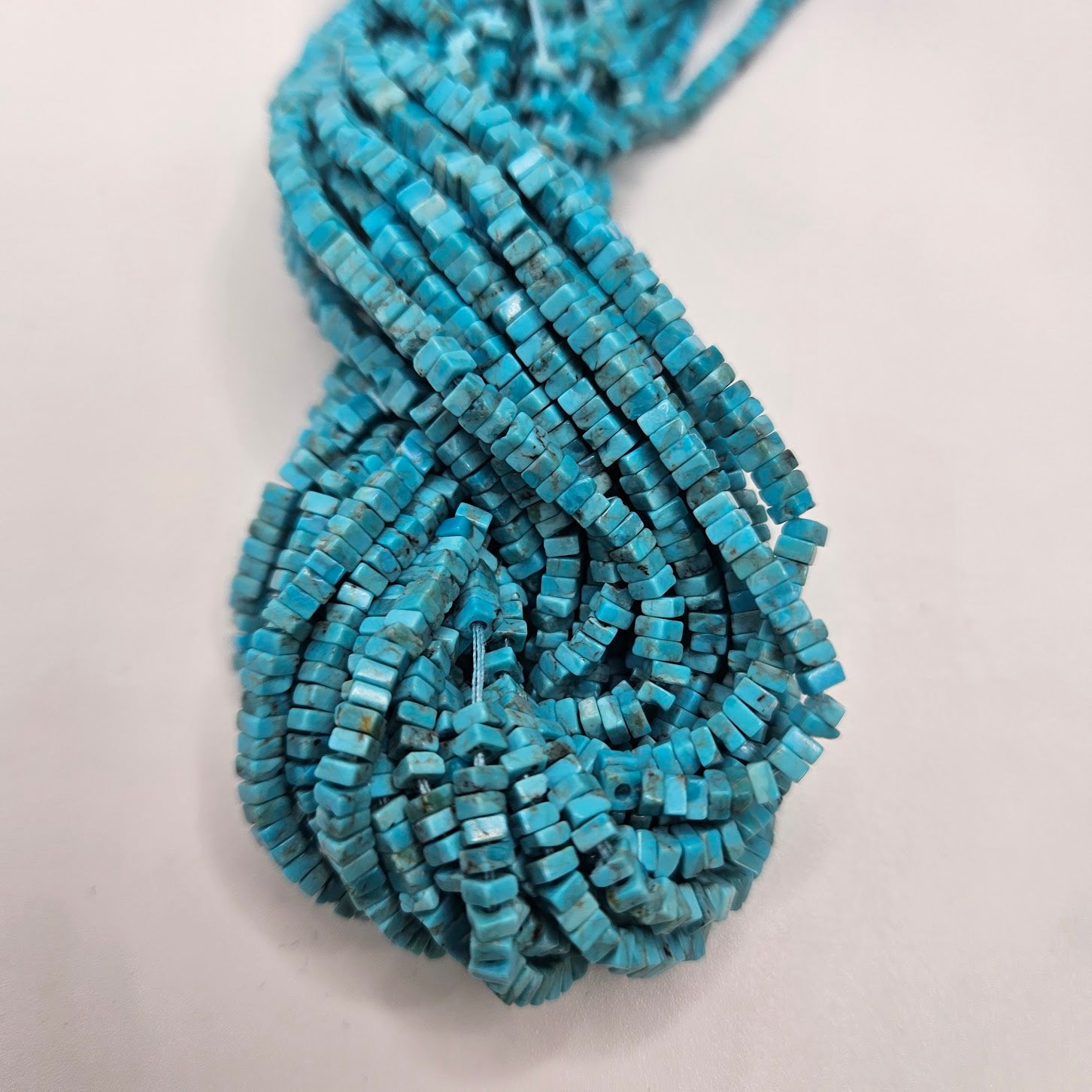 3mm Turquoise Square Strand.