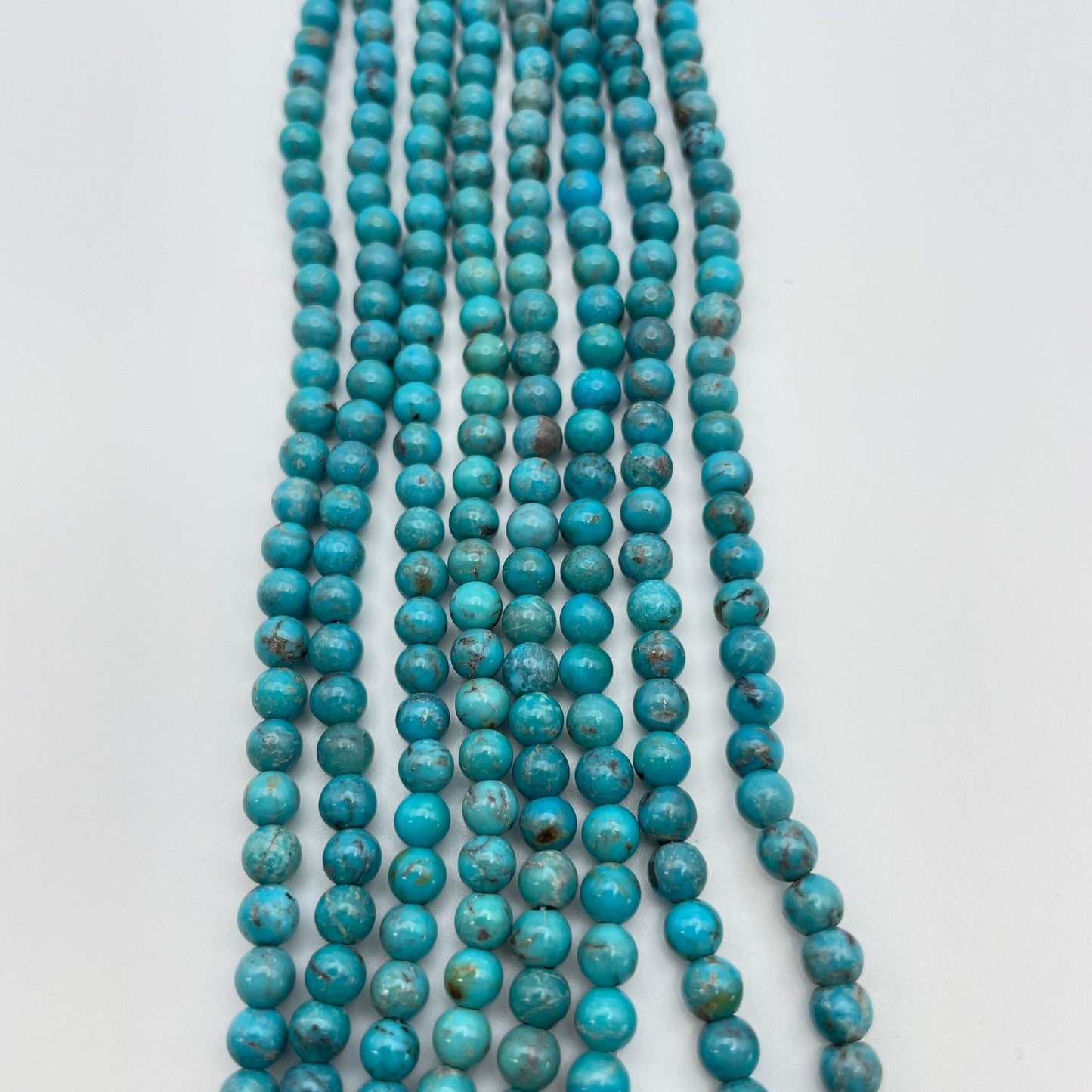 4mm Turquoise Smooth Round Strand