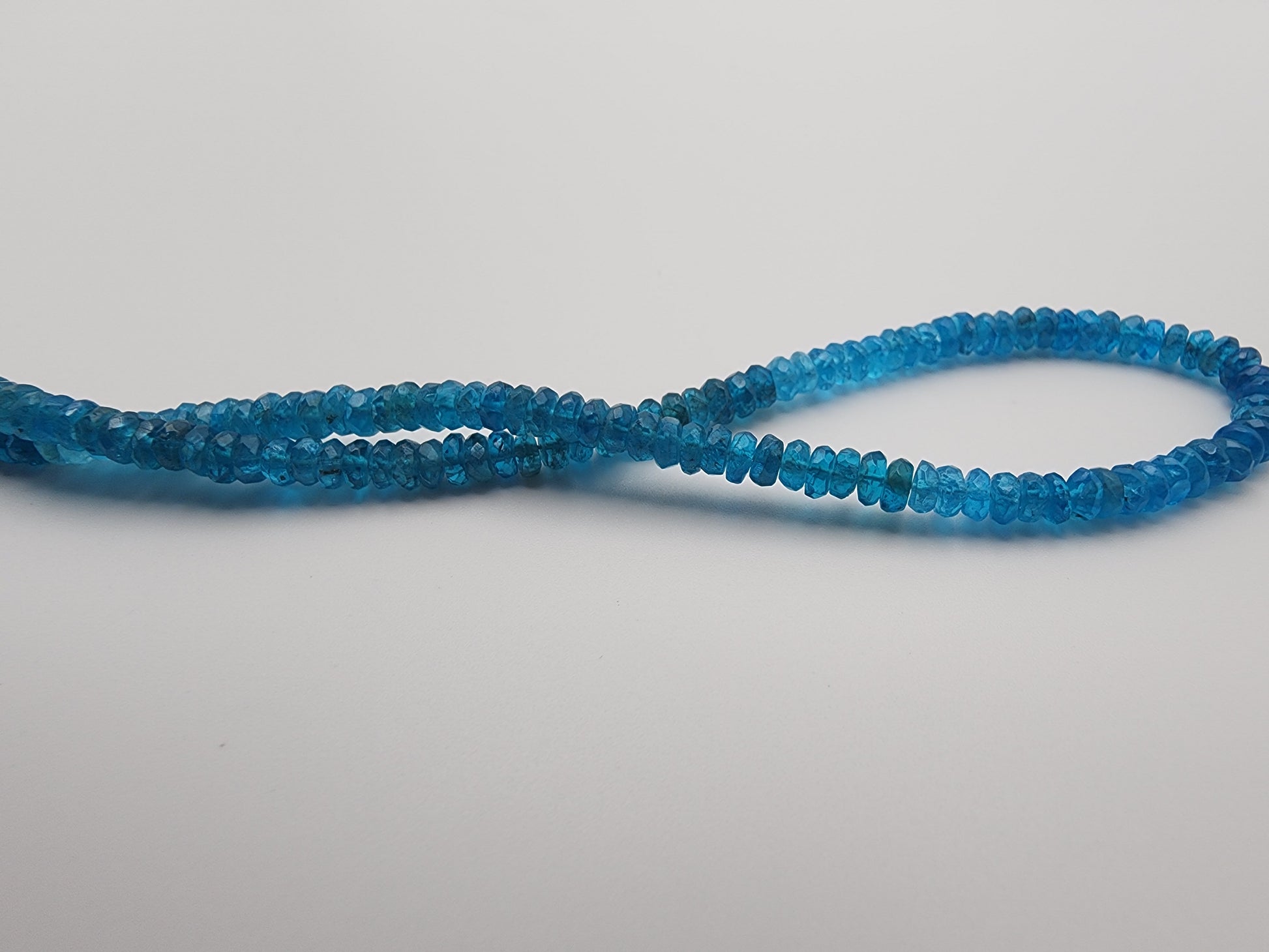 4mm Apatite A Quality Faceted Bead Strand.