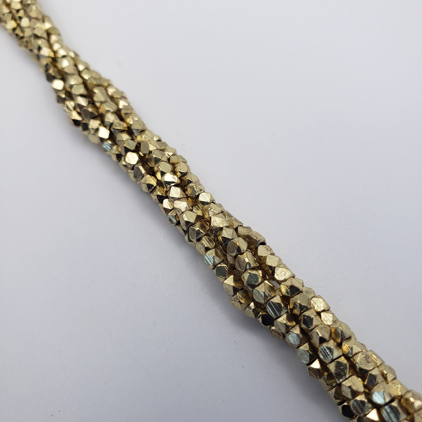 4mm Gold Cubed Faceted Seed Beads.