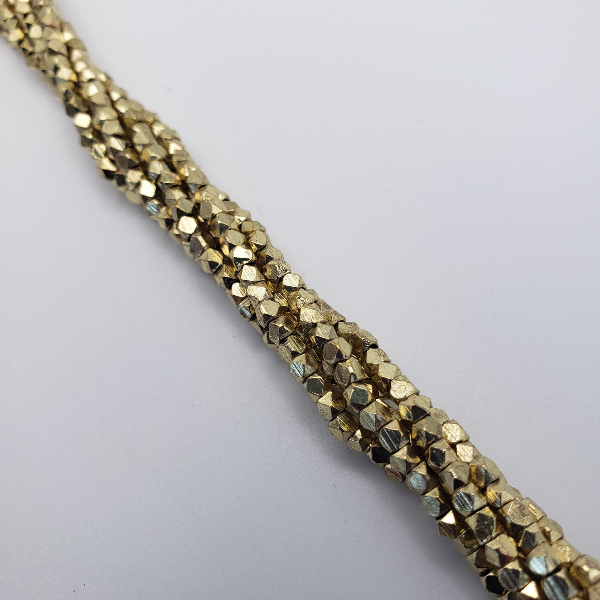 4mm Gold Cubed Faceted Seed Beads.