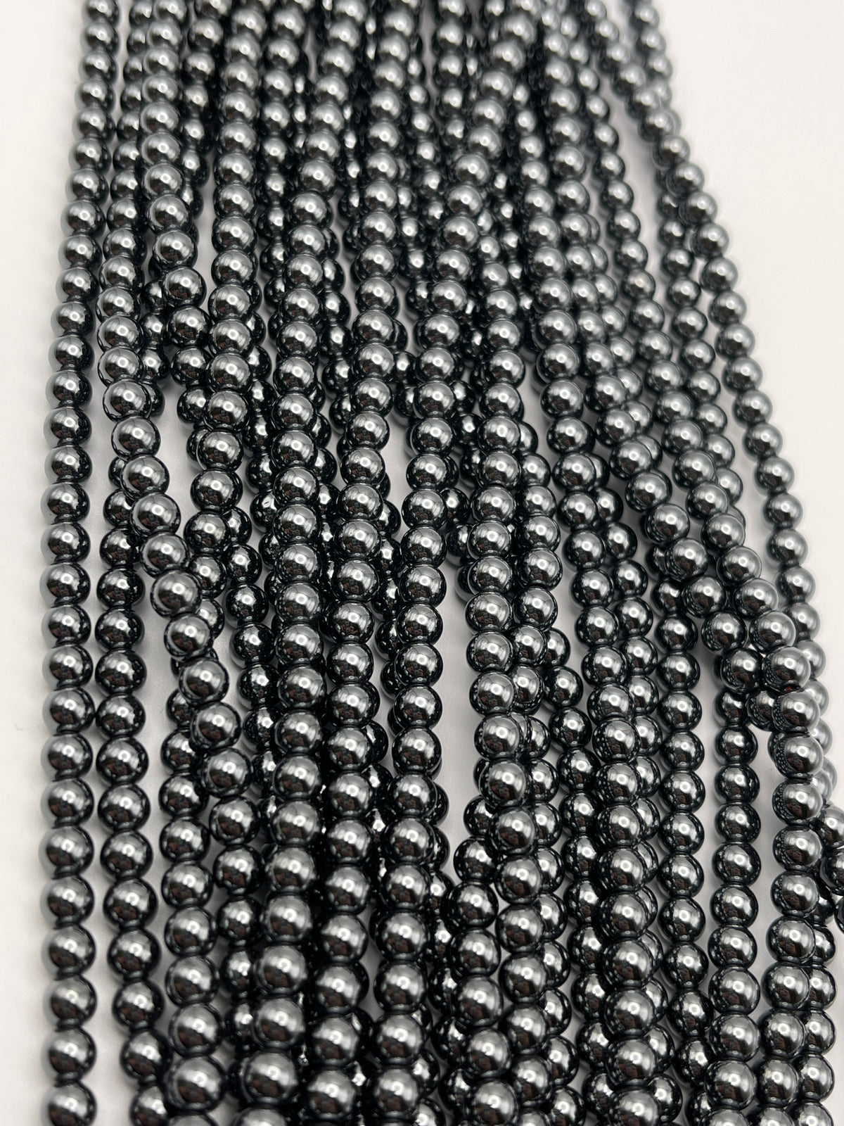 4mm Hematite Gunmetal Round Bead Strand.