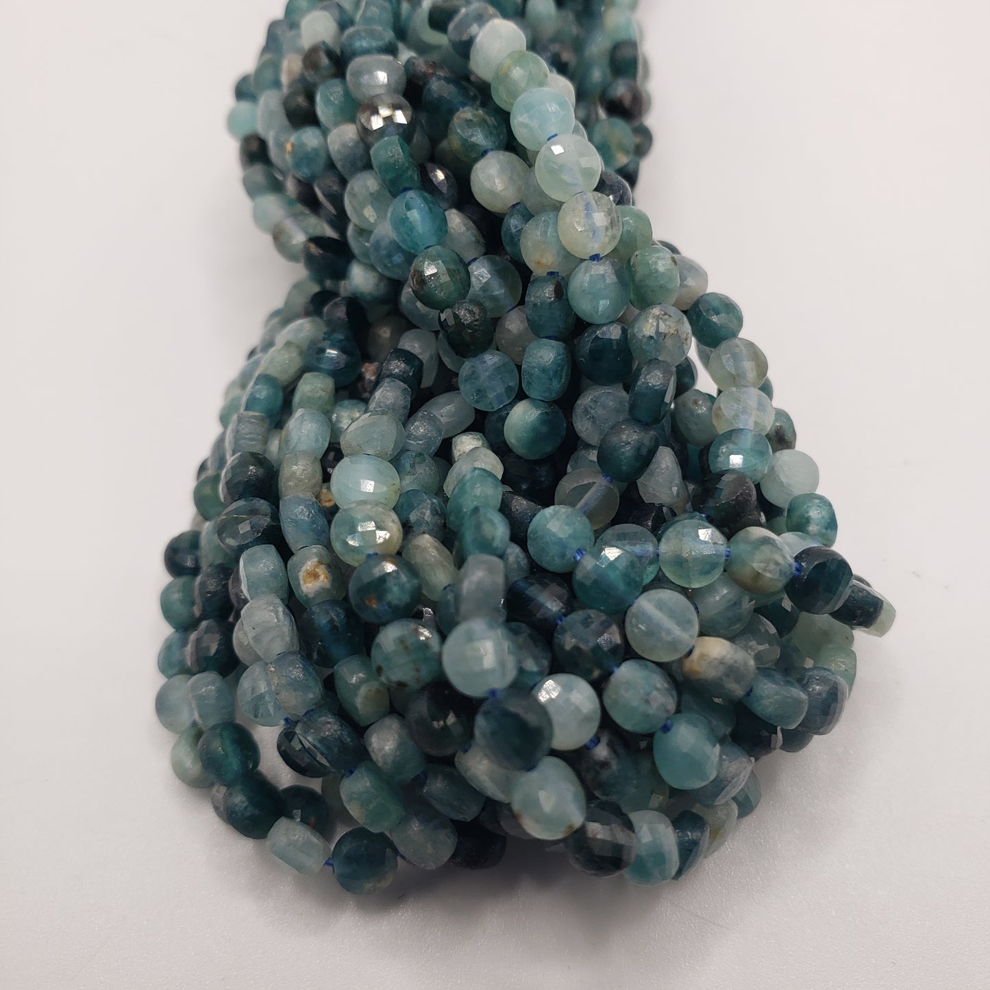 4mm Blue Tourmaline Coin Faceted.