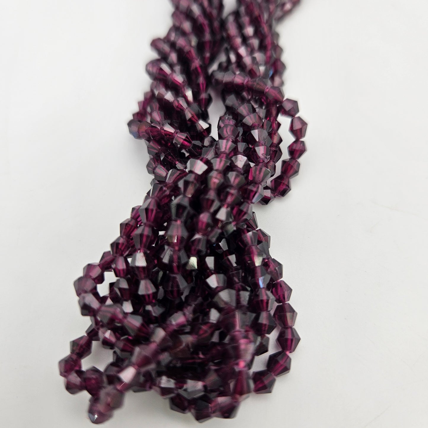 4mm Garnet Bicone Smooth Bead Strand.