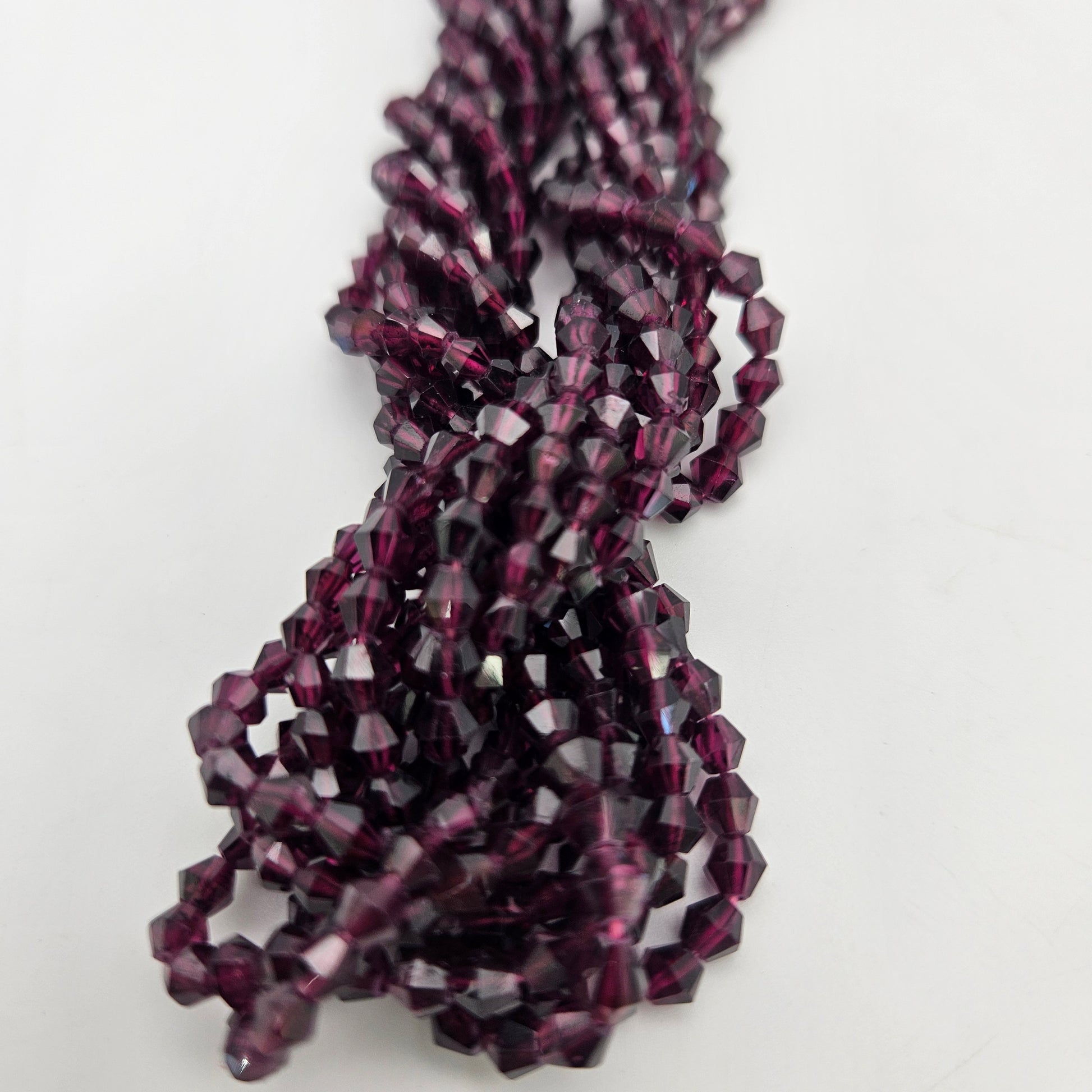 4mm Garnet Bicone Smooth Bead Strand.