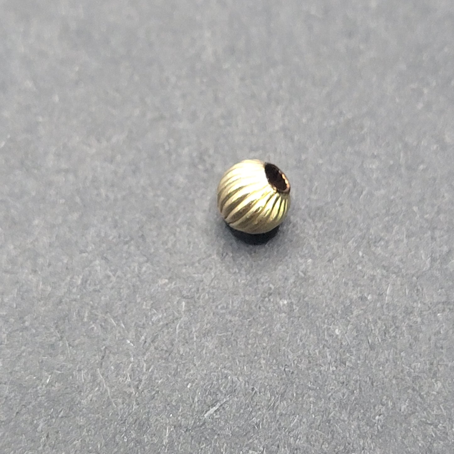 4mm Gold Filled Corrugated Round Bead Sold Individually.