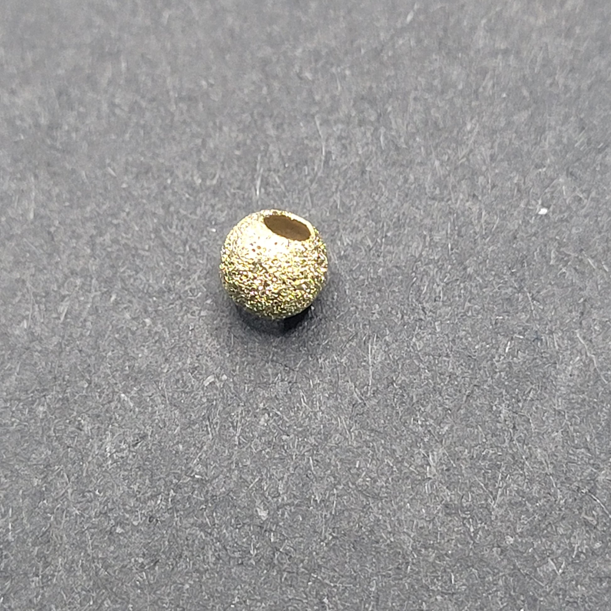 4mm Gold Filled Stardust Round Bead sold Individually.