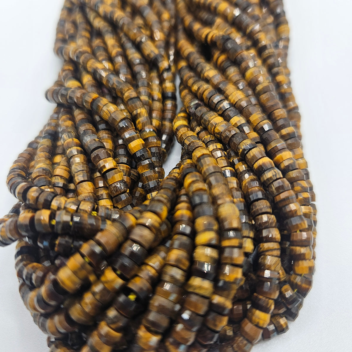 4mm Tiger Eye Faceted Heishi Bead Strand.