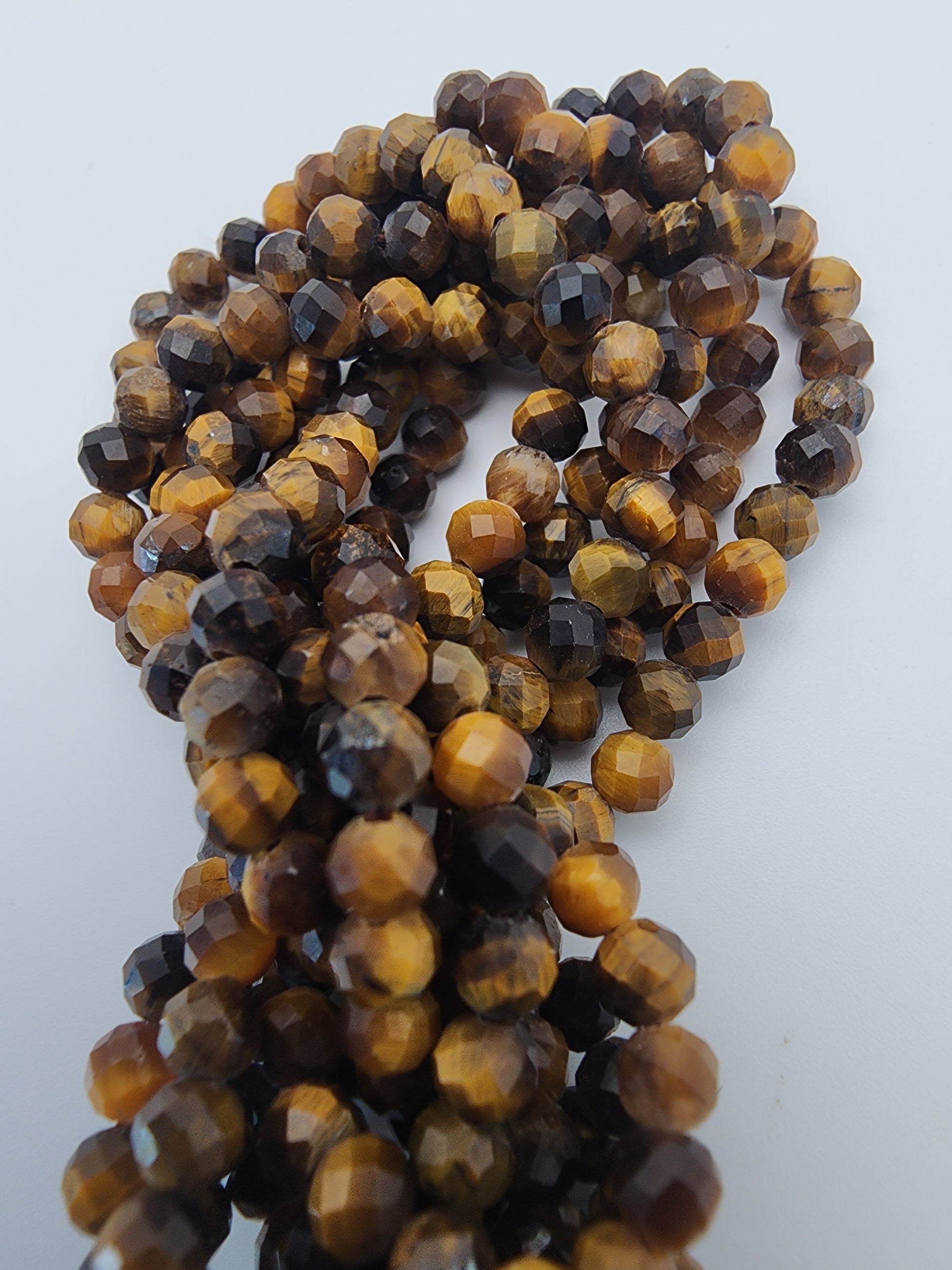 4mm Tiger's Eye Faceted Bead Strand.