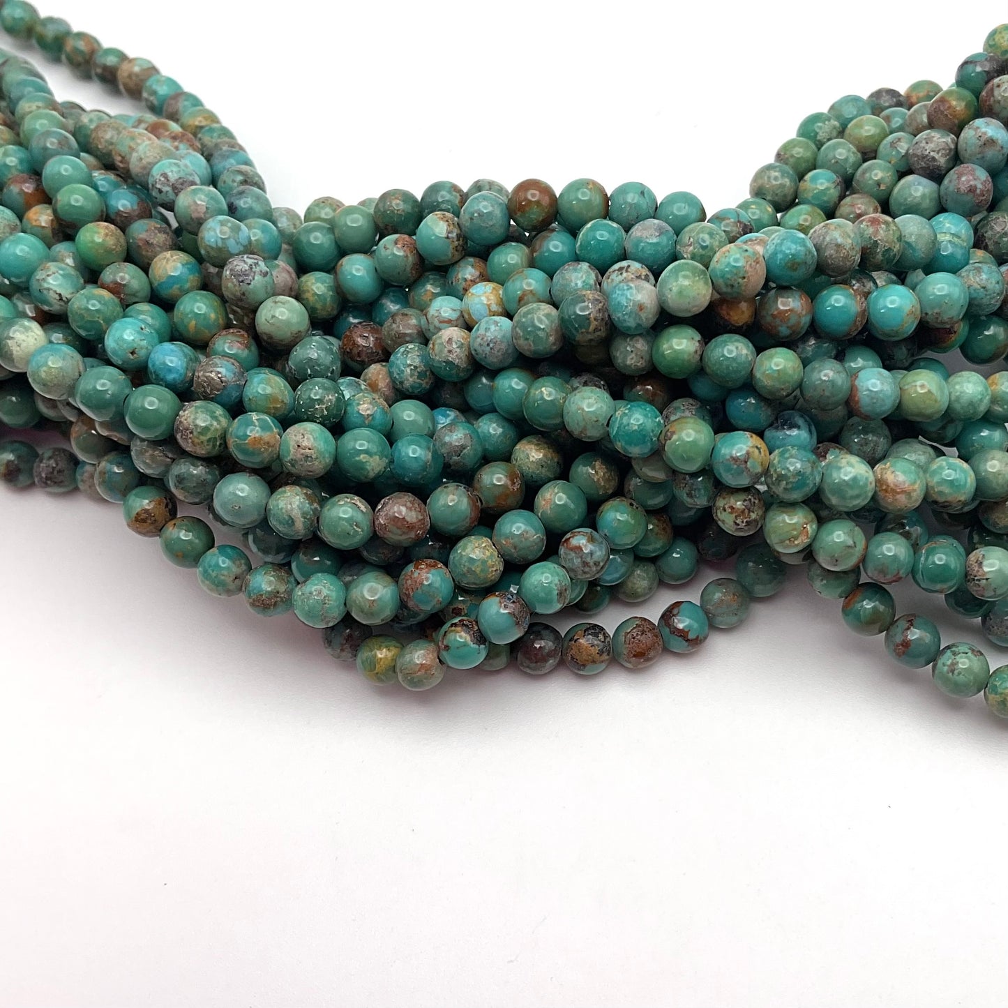 4mm Turquoise Round Smooth Bead Strand.