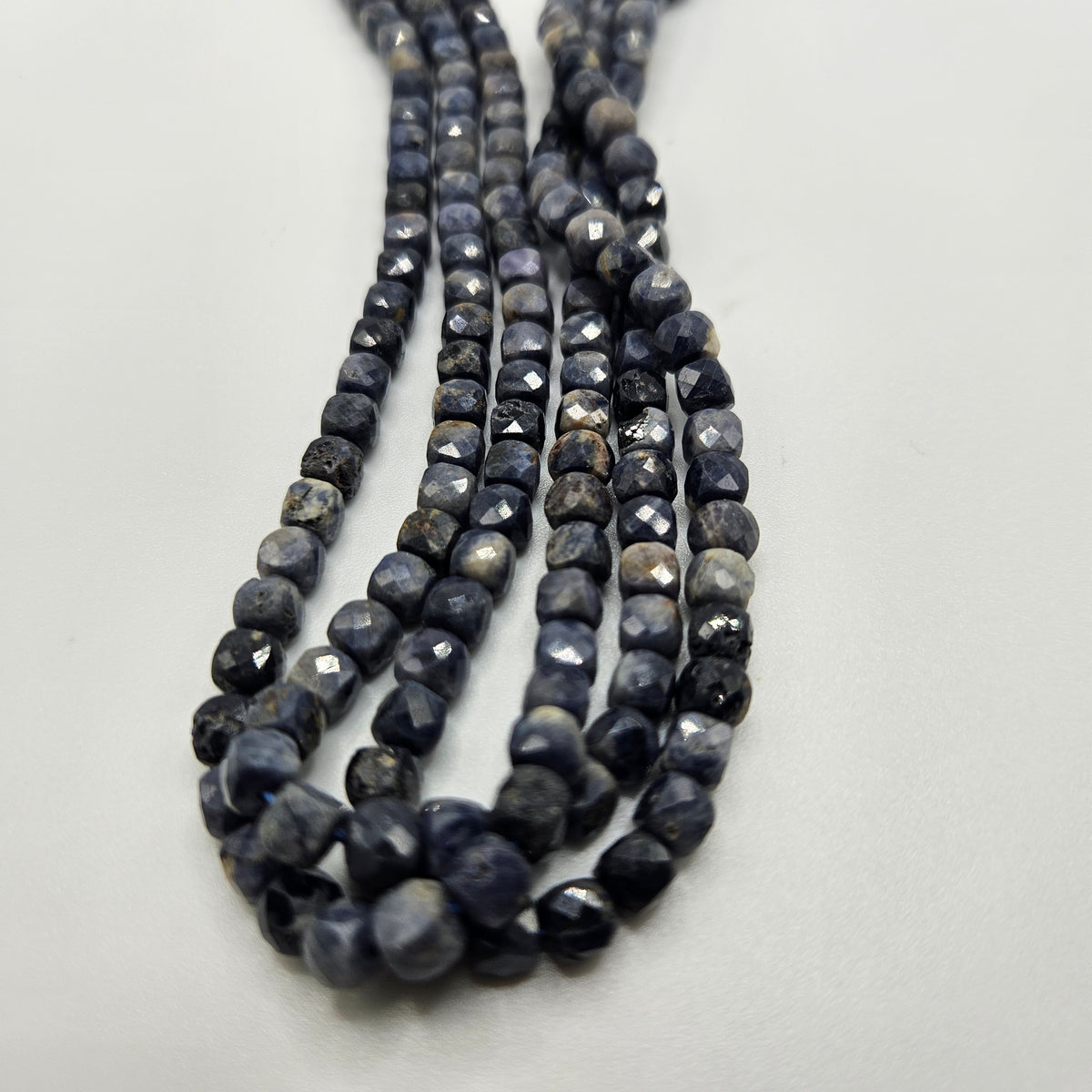 4x4mm Faceted Sapphire Cube Bead Strand.