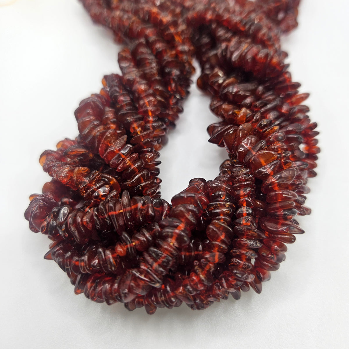 5-6mm Amber Chip Bead Strand.
