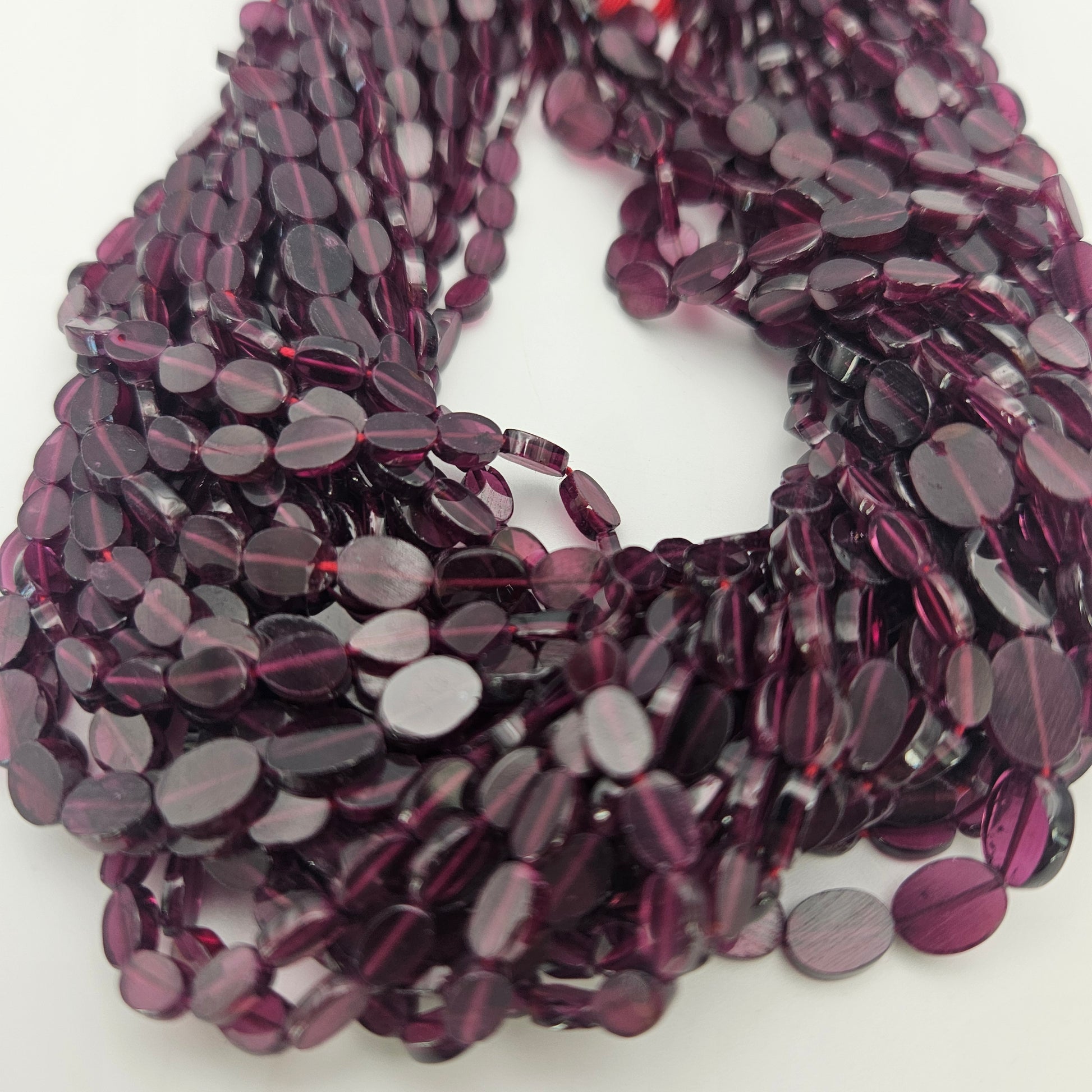 5-6mm Garnet Oval Smooth Bead Strand.
