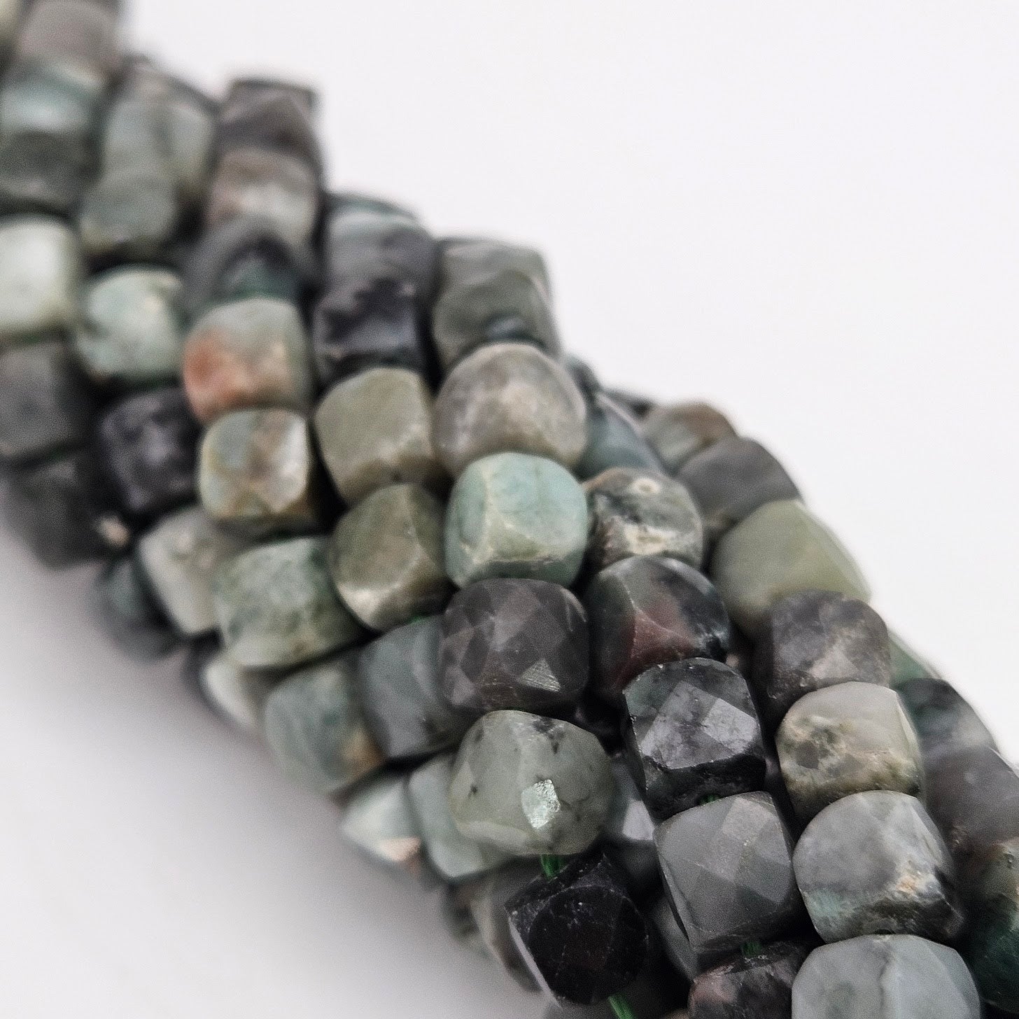 5mm Cubed Faceted Emerald Bead Strand.