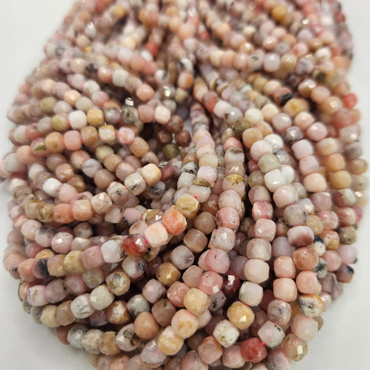 5mm Faceted Pink Opal Cube Bead Strand.