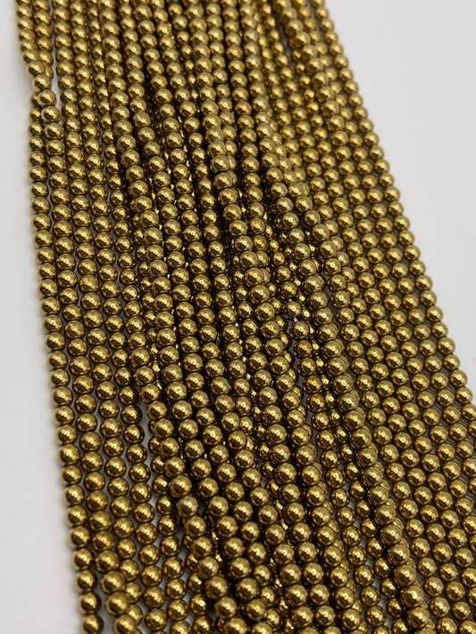 5mm Hematite Gold Round Bead Strand.