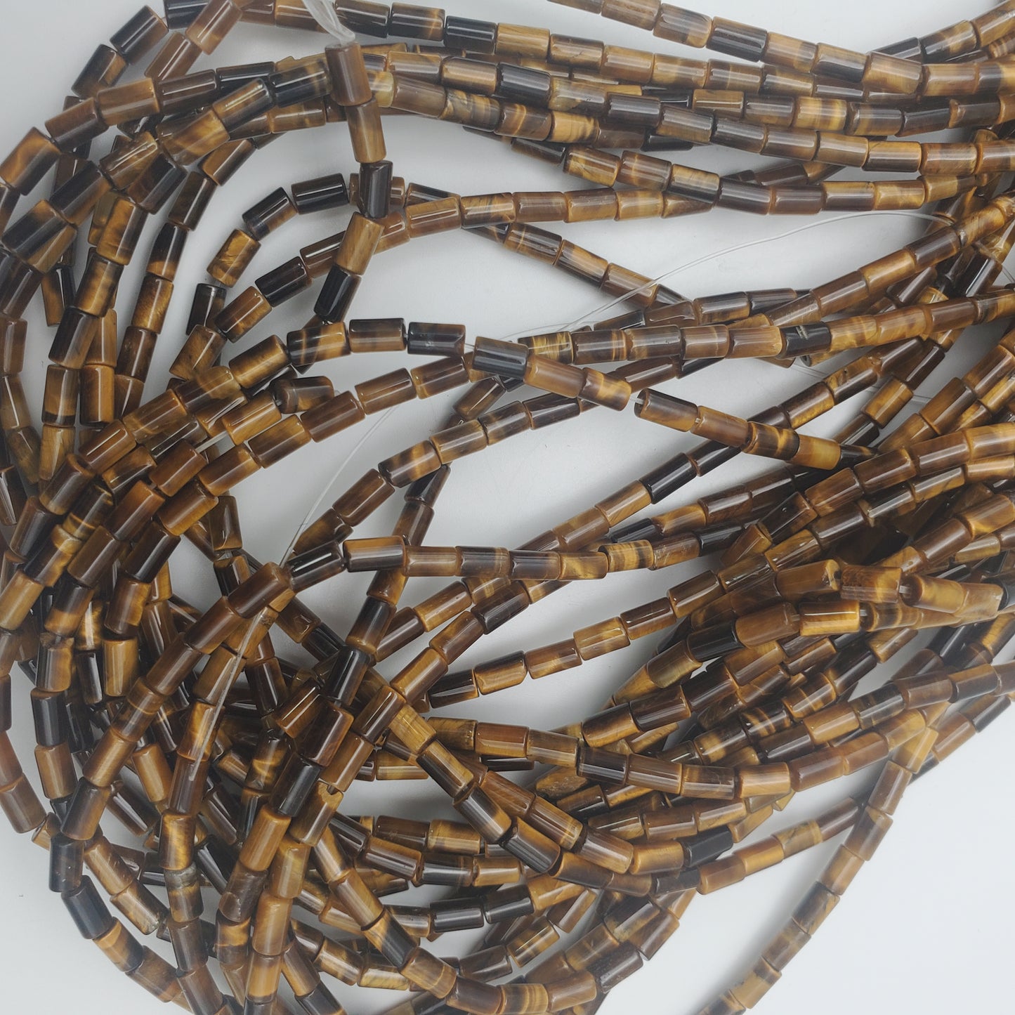5mm Tigers Eye Tube Bead Strand.