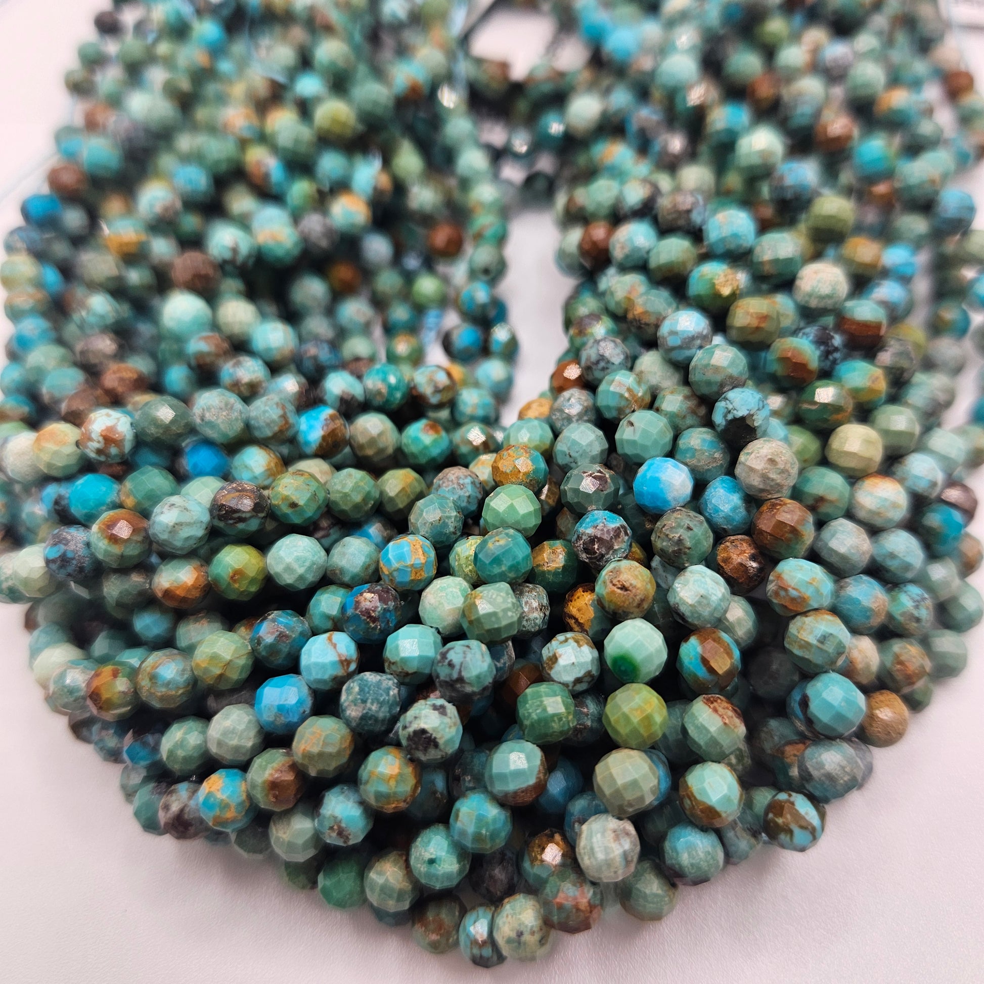 5mm Turquoise Faceted Round Bead Strand.